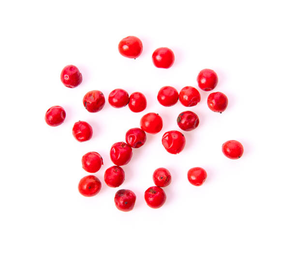 istock red  peppercorn isolated on white background 1221385404
