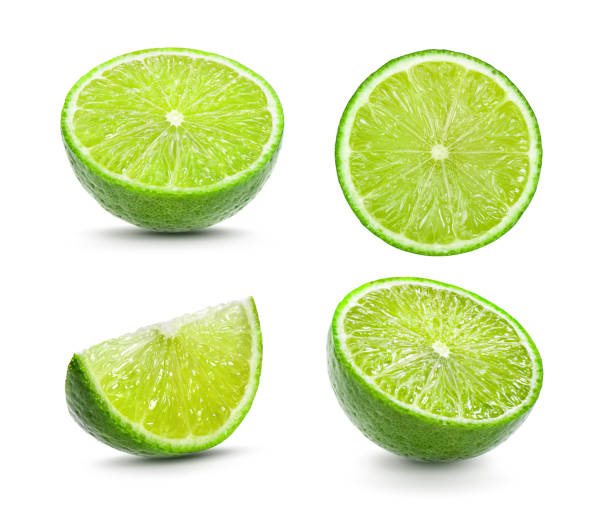 istock Juicy slice of lime on white background 1221385731
