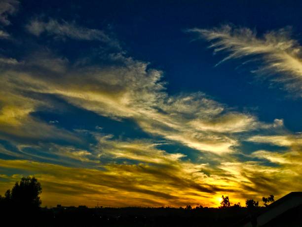 istock high clouds / orange sunset in mission valley 1221386718