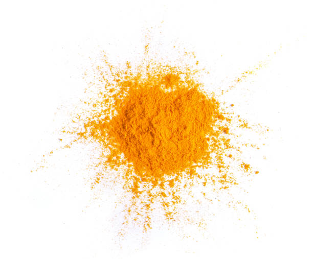 istock Turmeric (Curcuma) powder pile isolated on white background, top view 1221387156