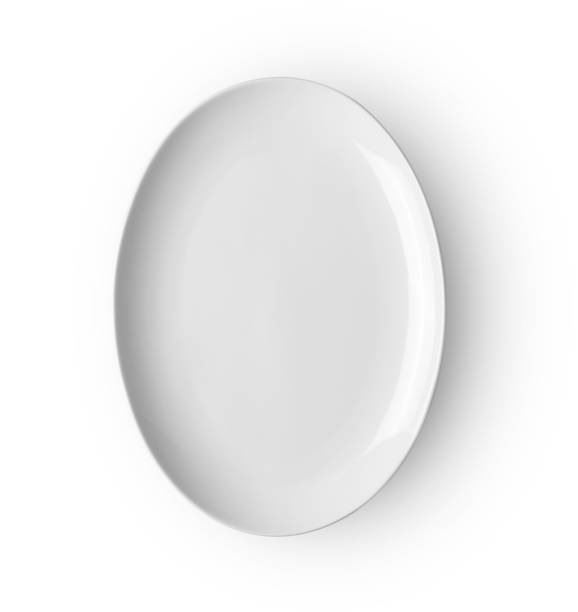 istock ceramic plate isolated on white backgroud. top view 1221387284