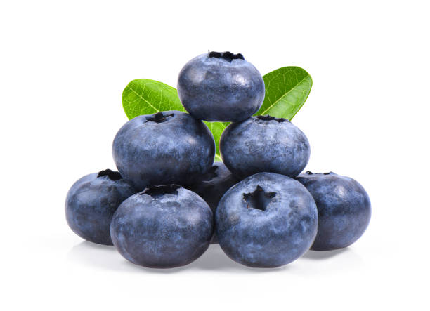 istock Blueberries with green leaves closeup, isolated on white background 1221387318