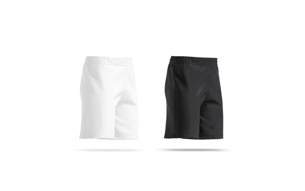istock Blank black and white soccer shorts mockup set, side view 1221389875