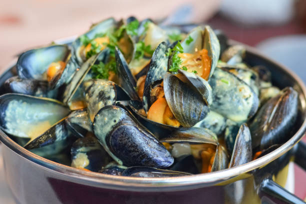 istock Mussels in a casserole with sauce curry 1221391729