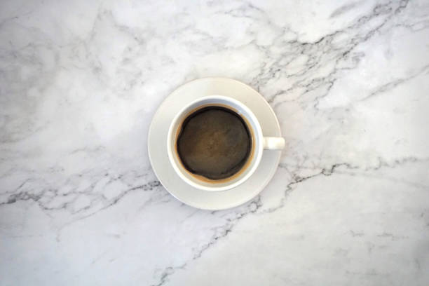 istock A cup of coffee on the marble desk 1221392095