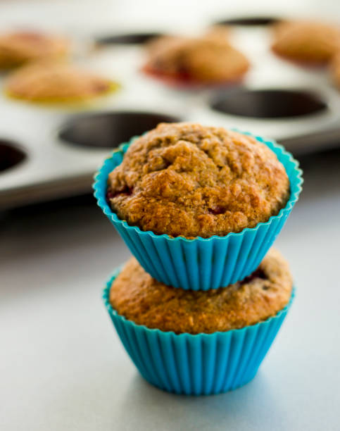 istock banana and raspberry muffin close up 1221395372