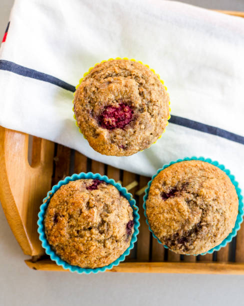 istock banana and raspberry muffin close up 1221395383