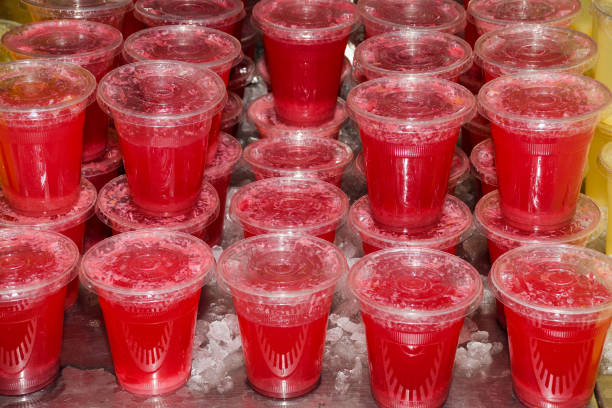istock juice drink cocktail plastic cups beverages 1221395553