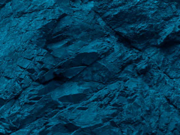 istock Blue green rock background. Toned mountain texture. Close-up. 1221395557