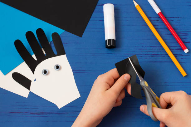 istock Child makes card for Father's Day. Step 8 1221395743