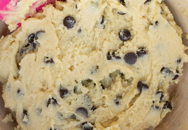 istock Homemade raw chocolate chips cookie dough on a bowl. 1221397461