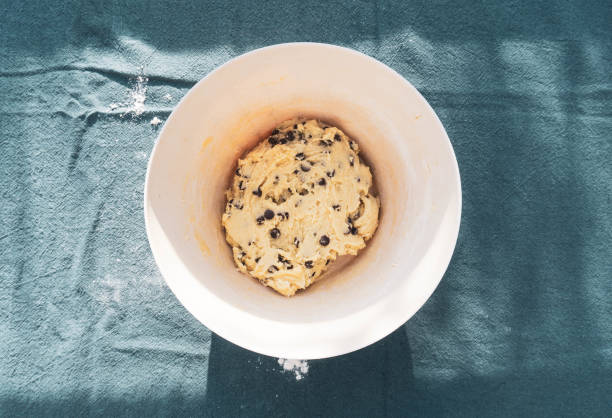 istock Homemade raw cookie dough on a bowl from above. Top view. 1221397483