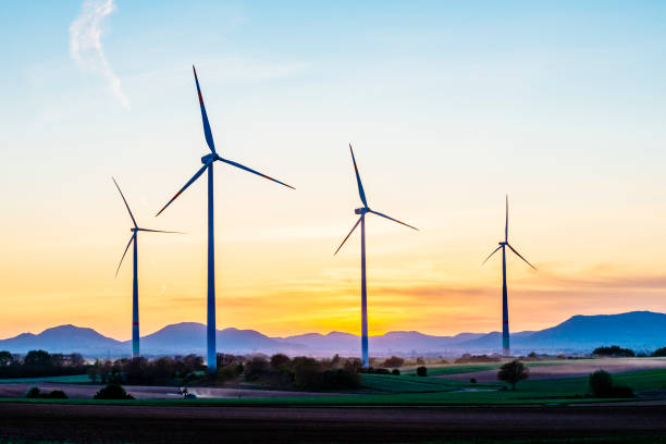 istock silhouetten of windmills 1221399397