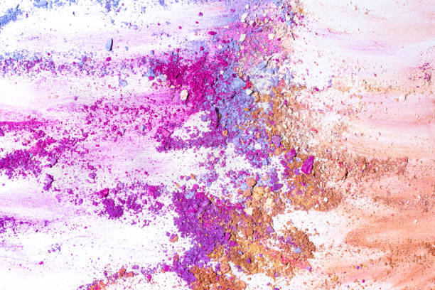 istock Blue Purple and Pink crushed eye shadow isolated on white background.Splatter make up and cosmetic products. 1221400956