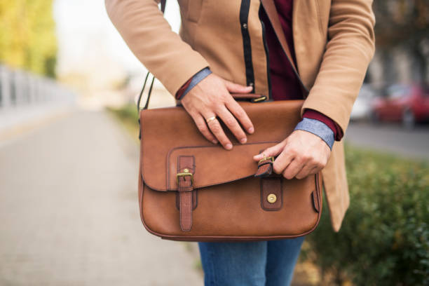 istock Close up of a man holding a briefcase. 1221402466