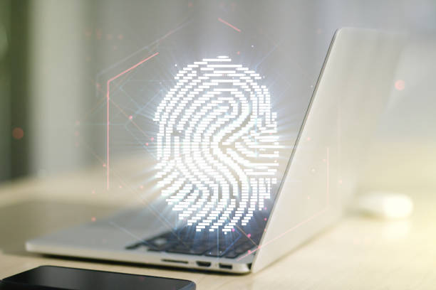 istock Double exposure of abstract creative fingerprint hologram on computer background, protection of personal information concept 1221402899