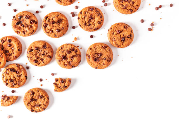 Chocolate chip cookies on a white background, shot from above with copy space Chocolate chip cookies on a white background, shot from above with copy space chocolate chip cookie top view stock pictures, royalty-free photos & images