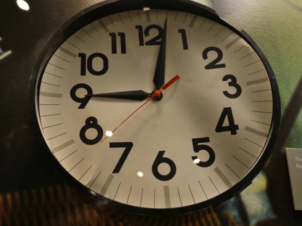 istock Broken round wall clock with arabic numerals with the hands stopping at 9:05 a.m. when the Alfred P. Murrah Federal Building was bombed in Oklahoma City in 1995. 1221404095