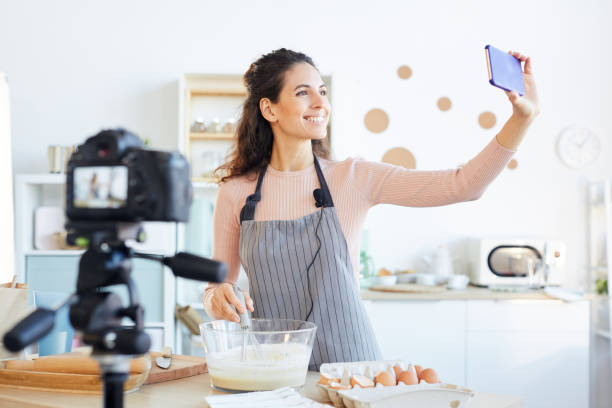 istock Food Blogger Taking Selfie 1221405161