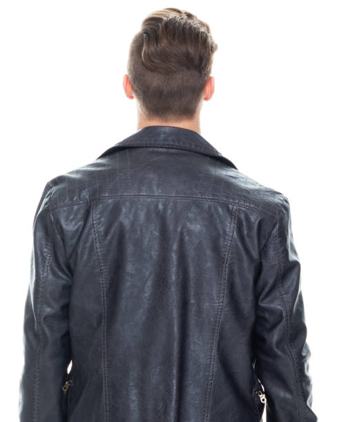 istock Caucasian boys standing in front of white background wearing button down shirt 1221406192