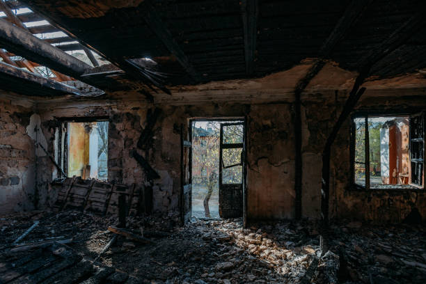 istock Burnt old rural house interior. Consequences of fire 1221406833