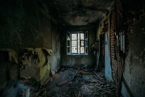 istock Burnt old rural house interior. Consequences of fire 1221406837