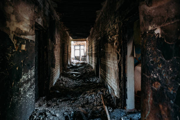 istock Burnt old rural house interior. Consequences of fire 1221406842