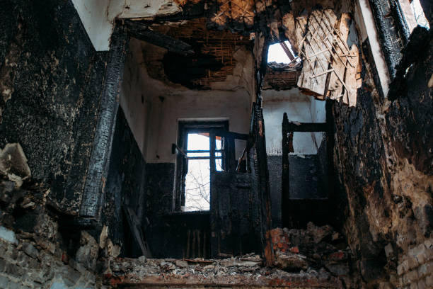 istock Burnt old rural house interior. Consequences of fire 1221406845