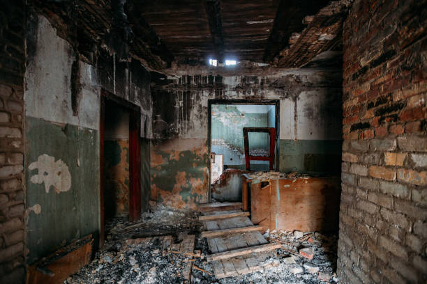 istock Burnt old rural house interior. Consequences of fire 1221406915