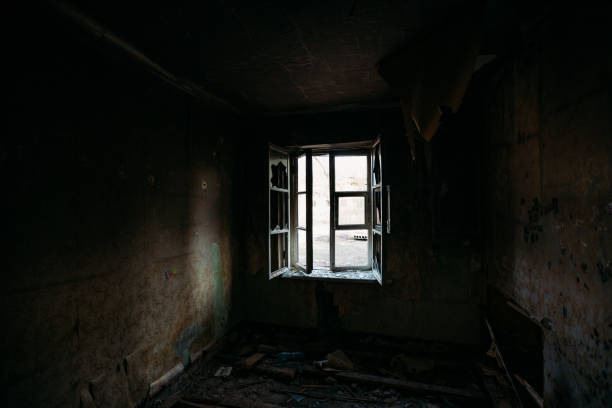 istock Burnt old rural house interior. Consequences of fire 1221406985