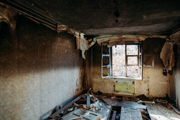 istock Burnt old rural house interior. Consequences of fire 1221407040