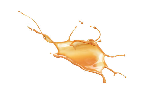 istock splash of liquid caramel on a white background 1221407169