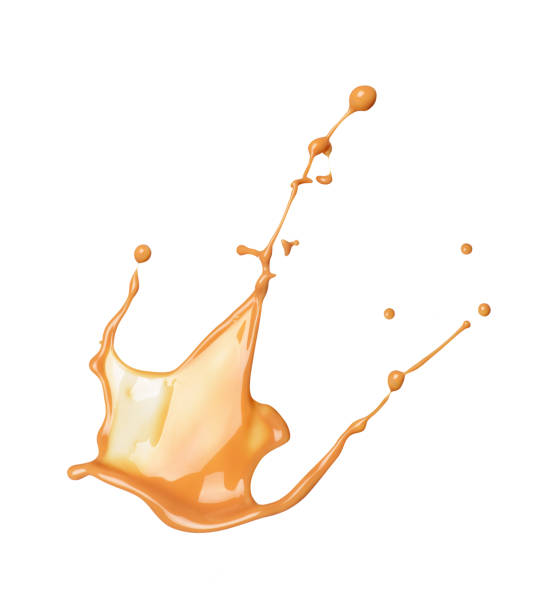 istock splash of liquid caramel on a white background 1221407206