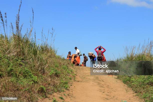 Pilgrims Walk Through The Mountain Path To Sabarimala Temple Stock Photo -  Download Image Now - iStock