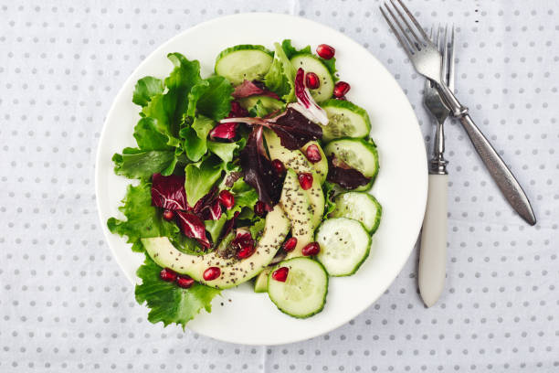 istock Lettuce salad with cucumber, avocado. 1221409157