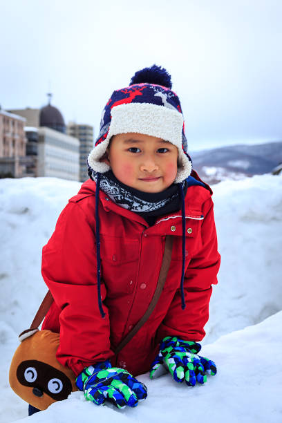istock A Naughty Boy in Snow 1221411353