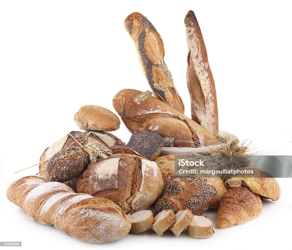 isolated heap of bread isolated assortment of bread on white background Baguette Stock Photo