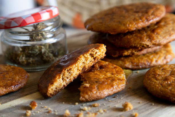 istock Cannabis marijuana cookies with honey 1221413100