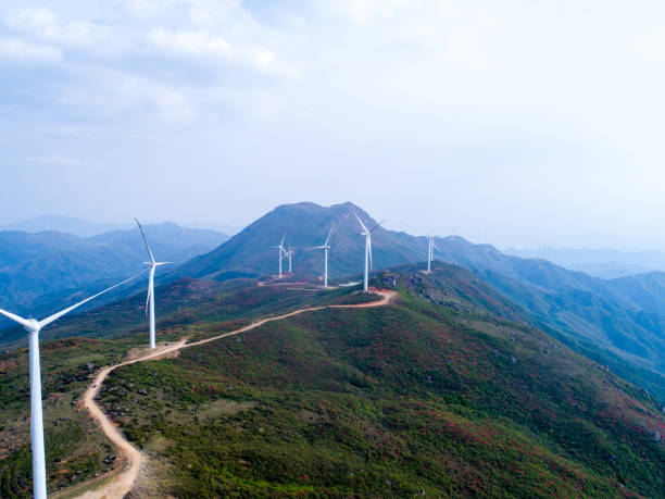 istock Wind Turbine sin sunset, china. 1221414095