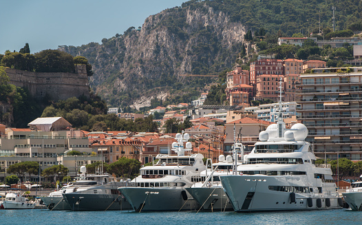 A picture of a group of yachts parked in Port Hercule.