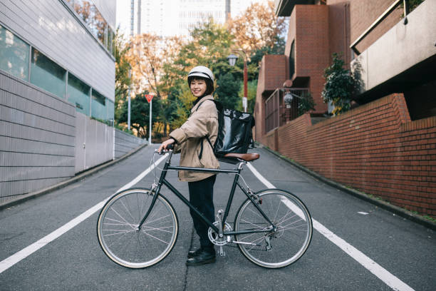istock Portrait Of Happy Bicycle Courier 1221415616