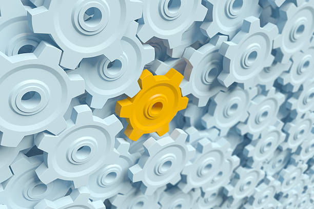 istock Orange cog or wheel standing out from the others 122141631