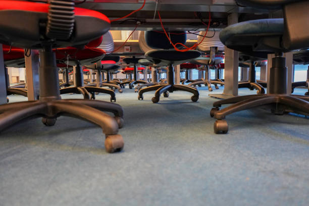 istock Low angle view of office chairs and desks 1221416837