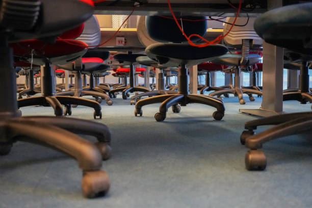 istock Low angle view of office chairs and desks 1221416991