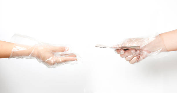 istock hand in plastic gloves.  To prevent corona virus. 1221417530