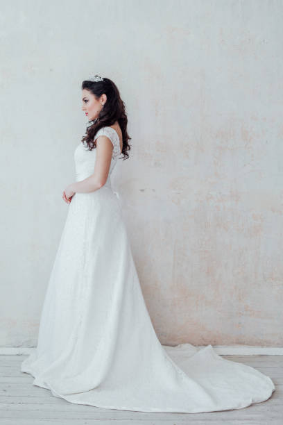 istock beautiful bride posing wedding hairstyle and dress 1221417555