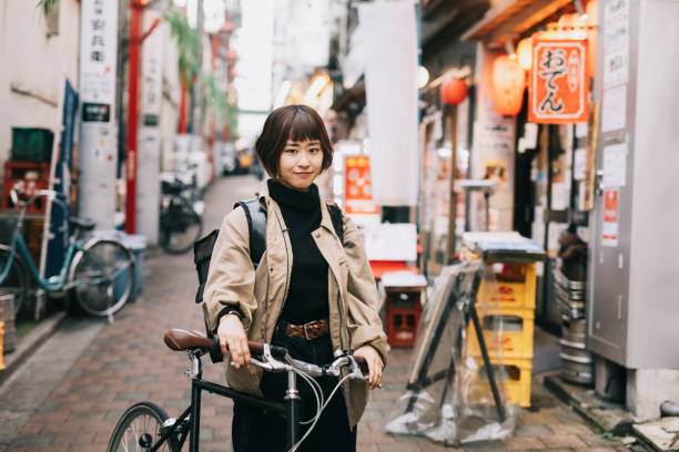 istock Food Courier With Her Bicycle 1221418478