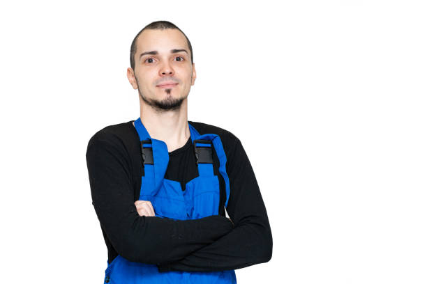 istock Professional repair, installation and maintenance technician. In a work suit 1221420024
