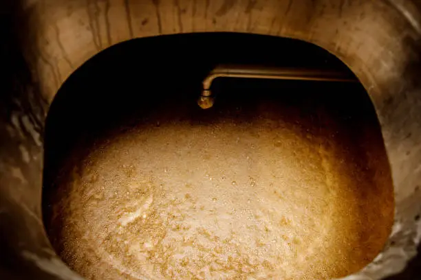 Beer in the brewing tank, top view