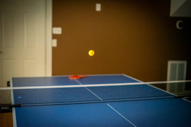 istock Ping pong ball in midair 1221422500